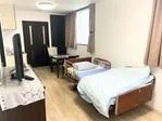 提供資料に掲載されたミルジュのベッドを備えた居室写真